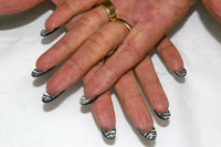Zebra undersides with Fashionably Slate, Vegas nights, sheer white and black shadow Gelish - Click here to enlarge this image